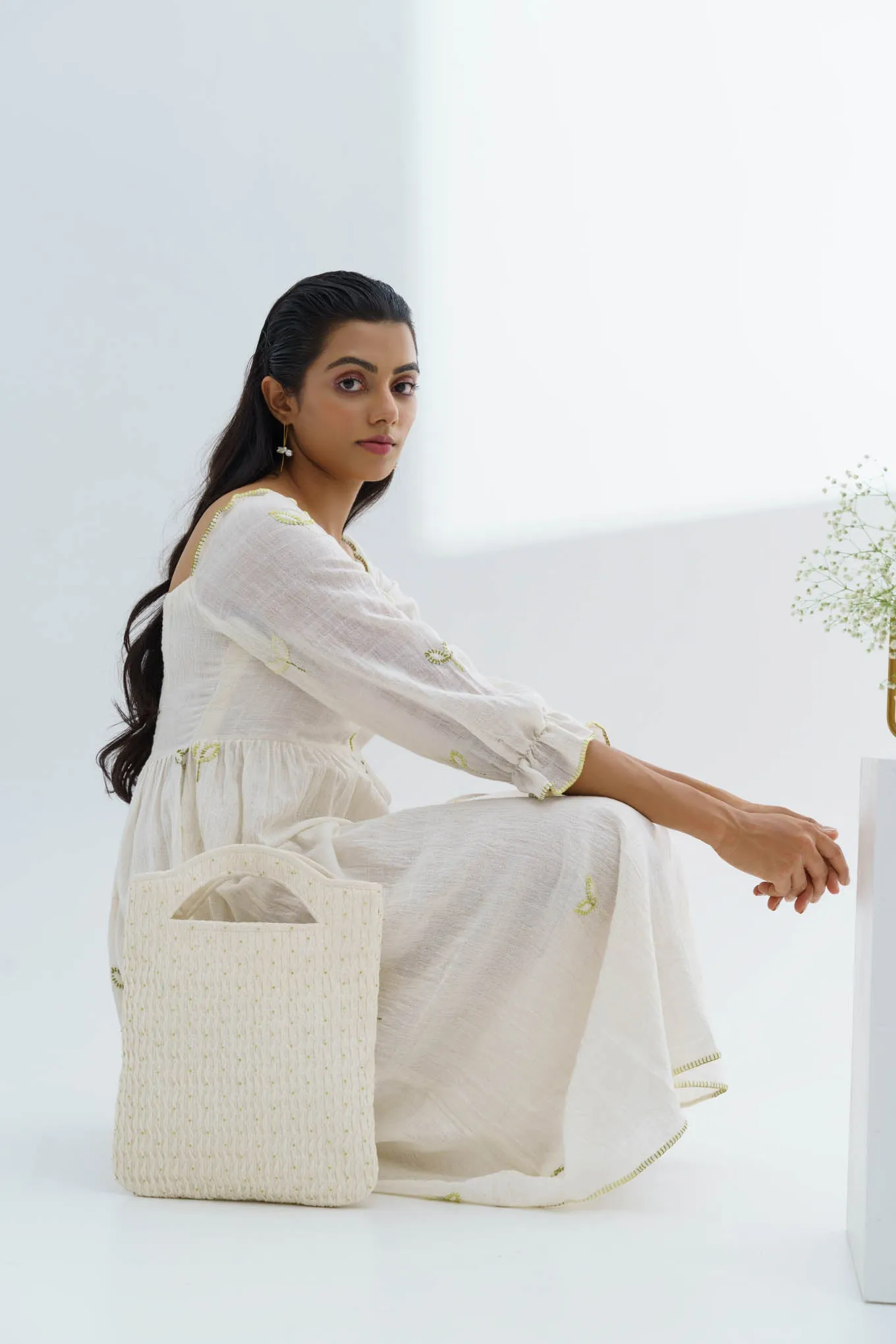 White handloom cotton smocked beaded bag